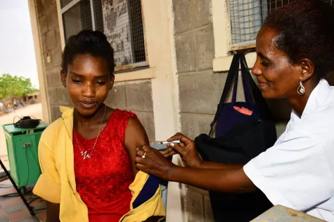 A girl receives a HPV vaccine in Afitela village, Barentu