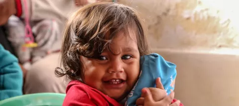 Aranza Benavente, 1 year old, received one of the sanitation kit distributed by UNICEF.