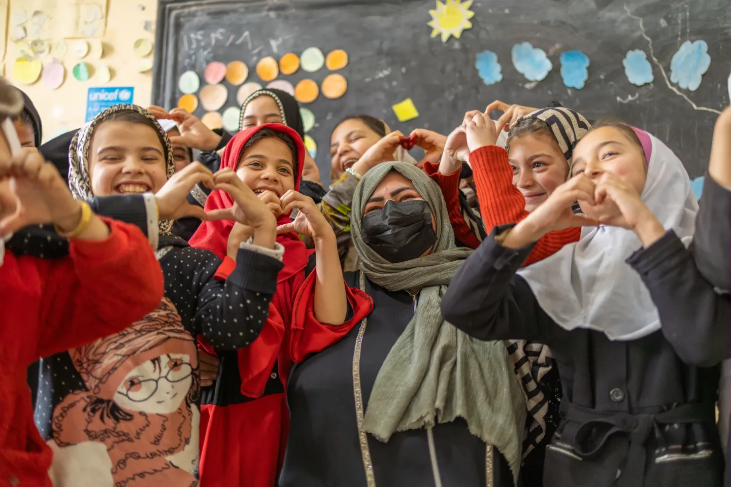 Students of grade 3 at Asem Primary School in Herat, Afghanistan, express appreciation and love for their teacher as they conclude the days lessons, being delivered under the FCDO funded, LEAP initiative of UNICEF Afghanistan. 