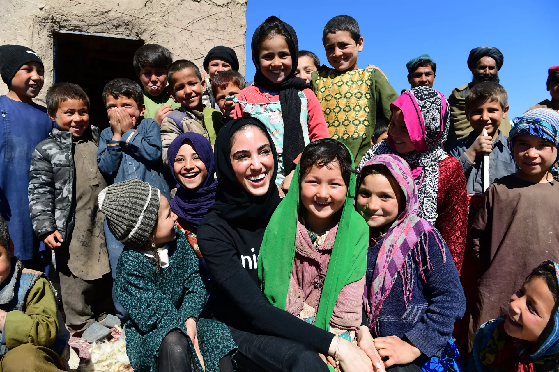 Nazanin Ajakila with children