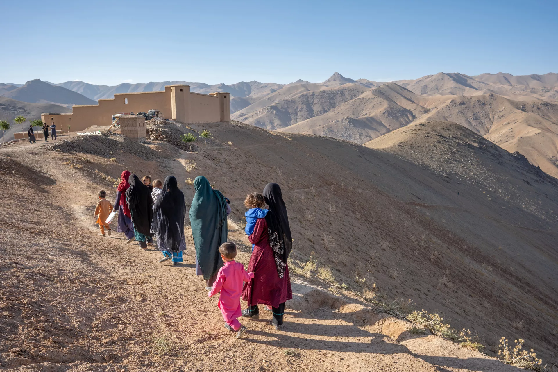 a group of women walking-Daikundi
