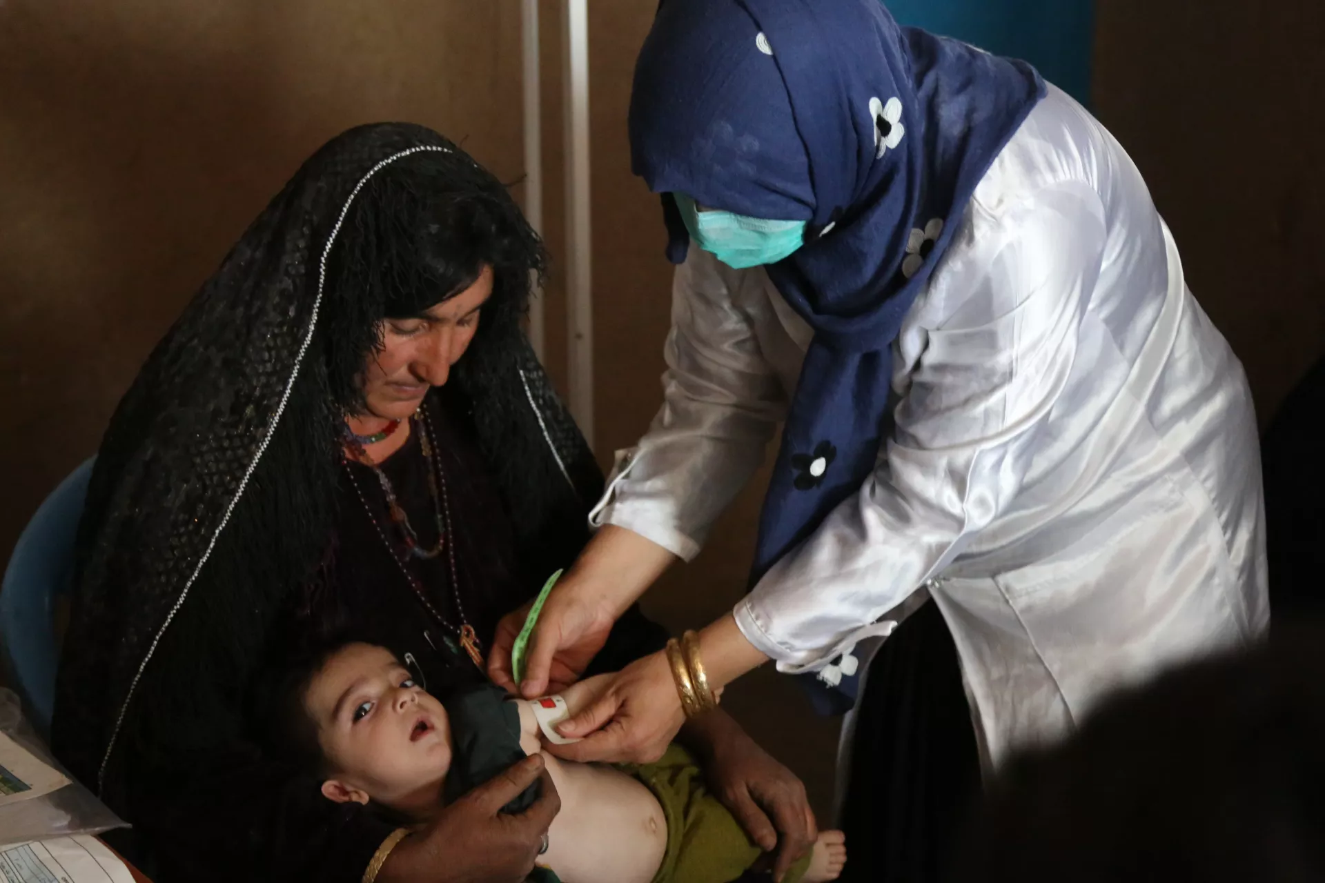 Asma,35 and her child