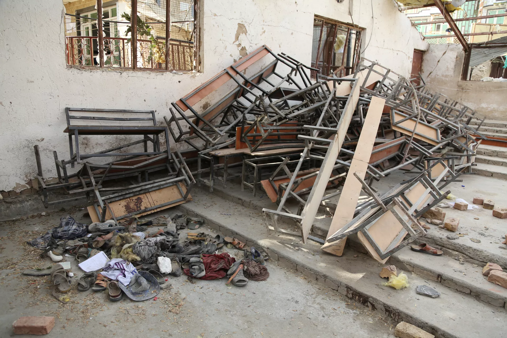 Belongings of the students who lost their lives are put together in a corner in the classroom.
