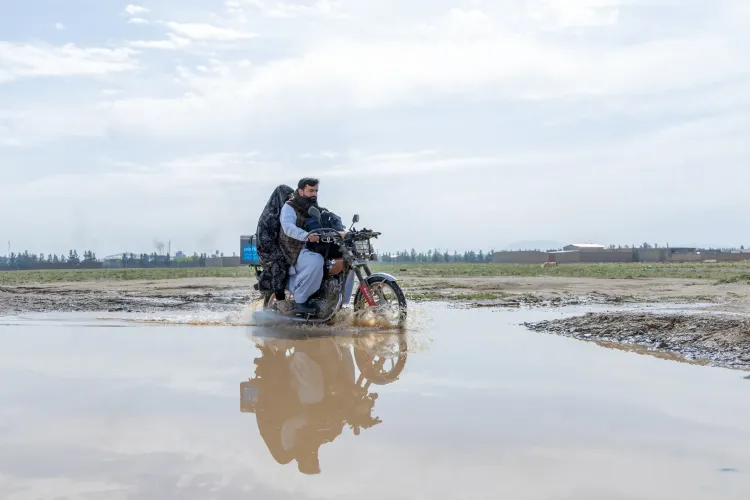 Omid and Nadia, the vaccinator couple travels a long and challenging roads by motorbike to reach the underserved communities and administer vaccines to children and women. 