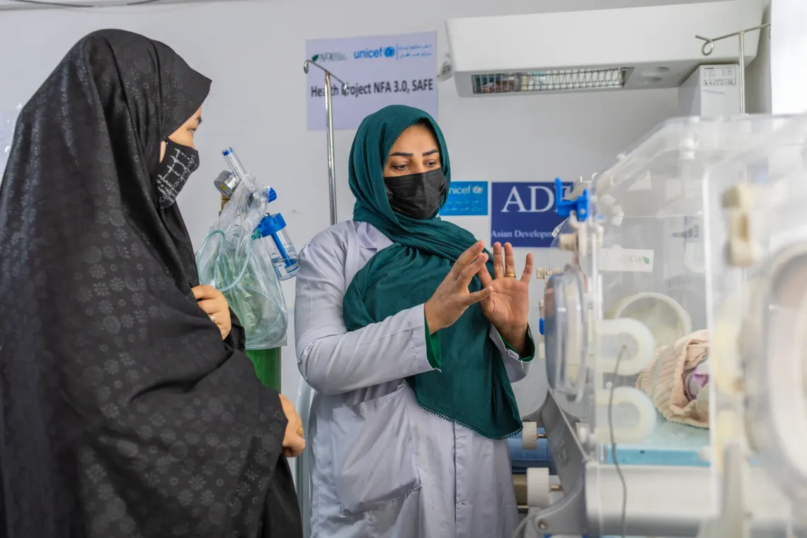 Suhaila, a midwife, guides Nilofar's grandmother, Fatima, on newborn care and explains how to support the baby's health during the baby's first days of life.