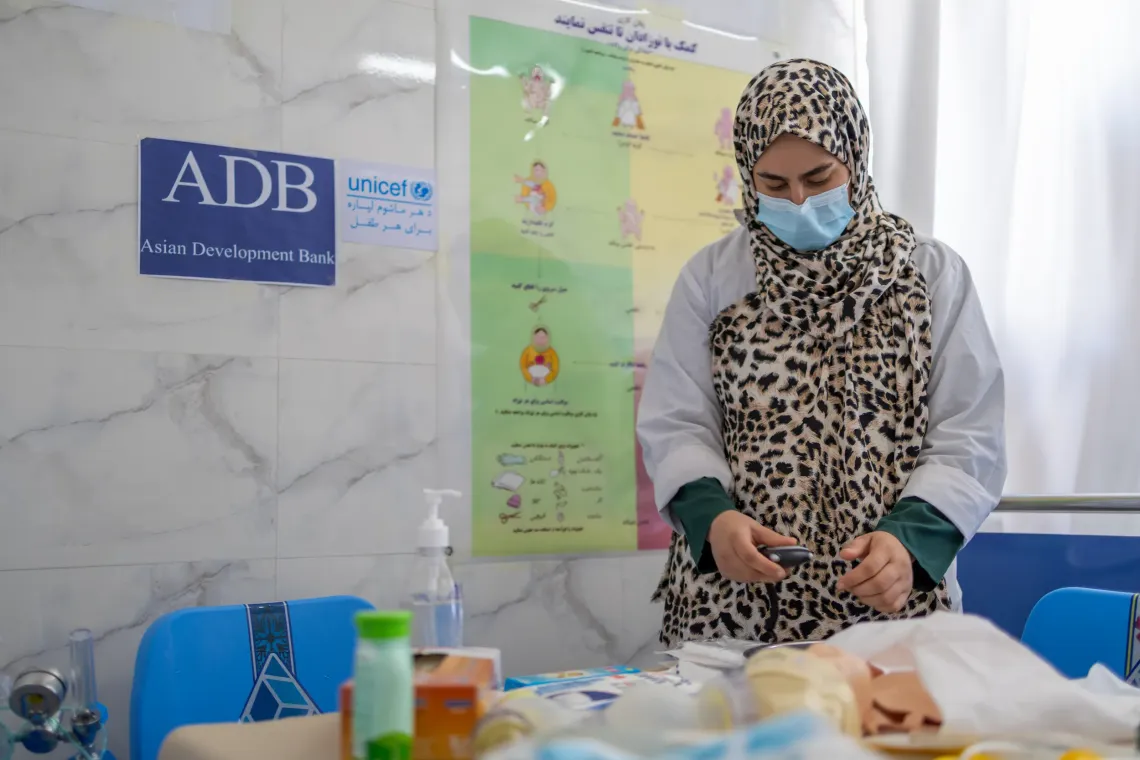 Parwana, 25, practices essential maternal and newborn care skills in the ADB- and UNICEF-supported Skills Lab, Guzara Clinic, Herat, Afghanistan.