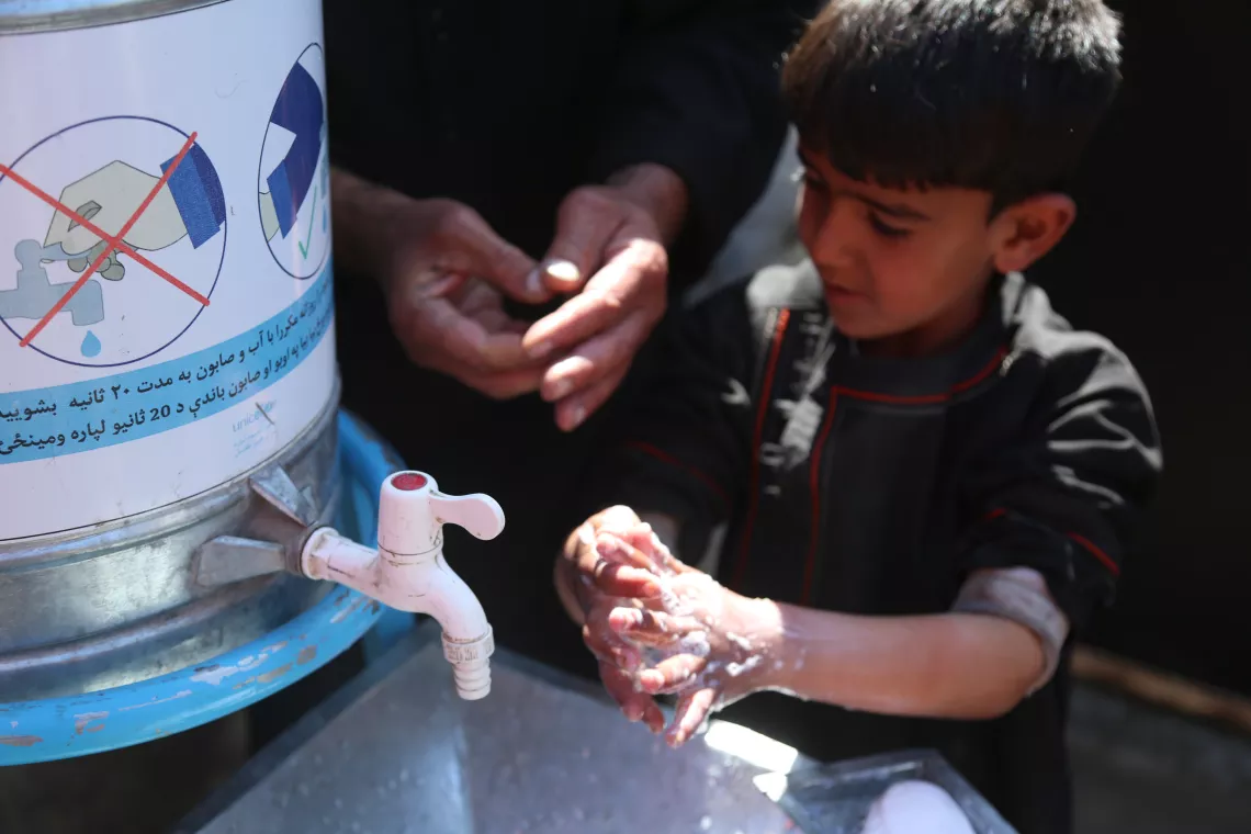 Every family in Qala-e Abdul Ali settlement now has a handwashing station with soap positioned directly outside their home, which draws clean water from the new solar-powered system.