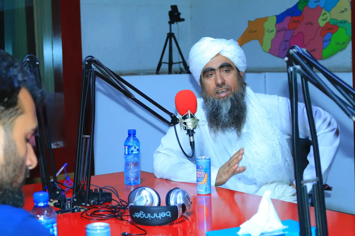  Rabani, a religious leader talks participate in radio round table discussion to provide awareness about the polio vaccine in Jalalabad city of Nangarhar. 