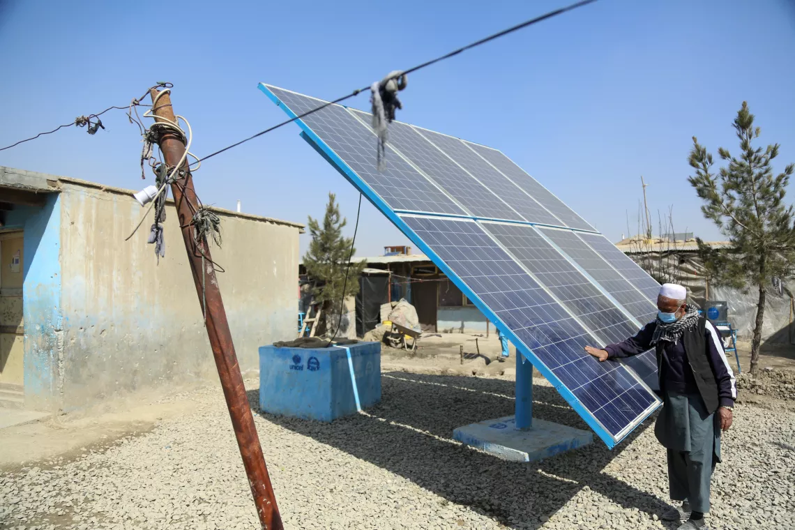 The new UNICEF supported water pump draws water from a borehole drilled to a greater depth than the previous system. Powered by the sun, the system provides water 24 hours per day to residents of the settlement.