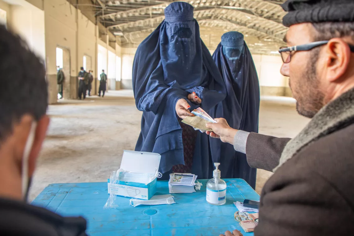 On 28 November 2023, Saeed Khanum receives 10,600 AFN in cash assistance from UNICEF, which she used to support her daughters' education in Parun district, Nuristan province, Afghanistan.