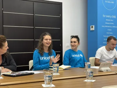 youth in a discussion with each other