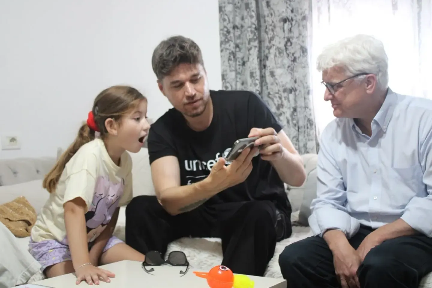 Mr. Edouard Beigbeder and UNICEF National Ambassador visiting a beneficiary