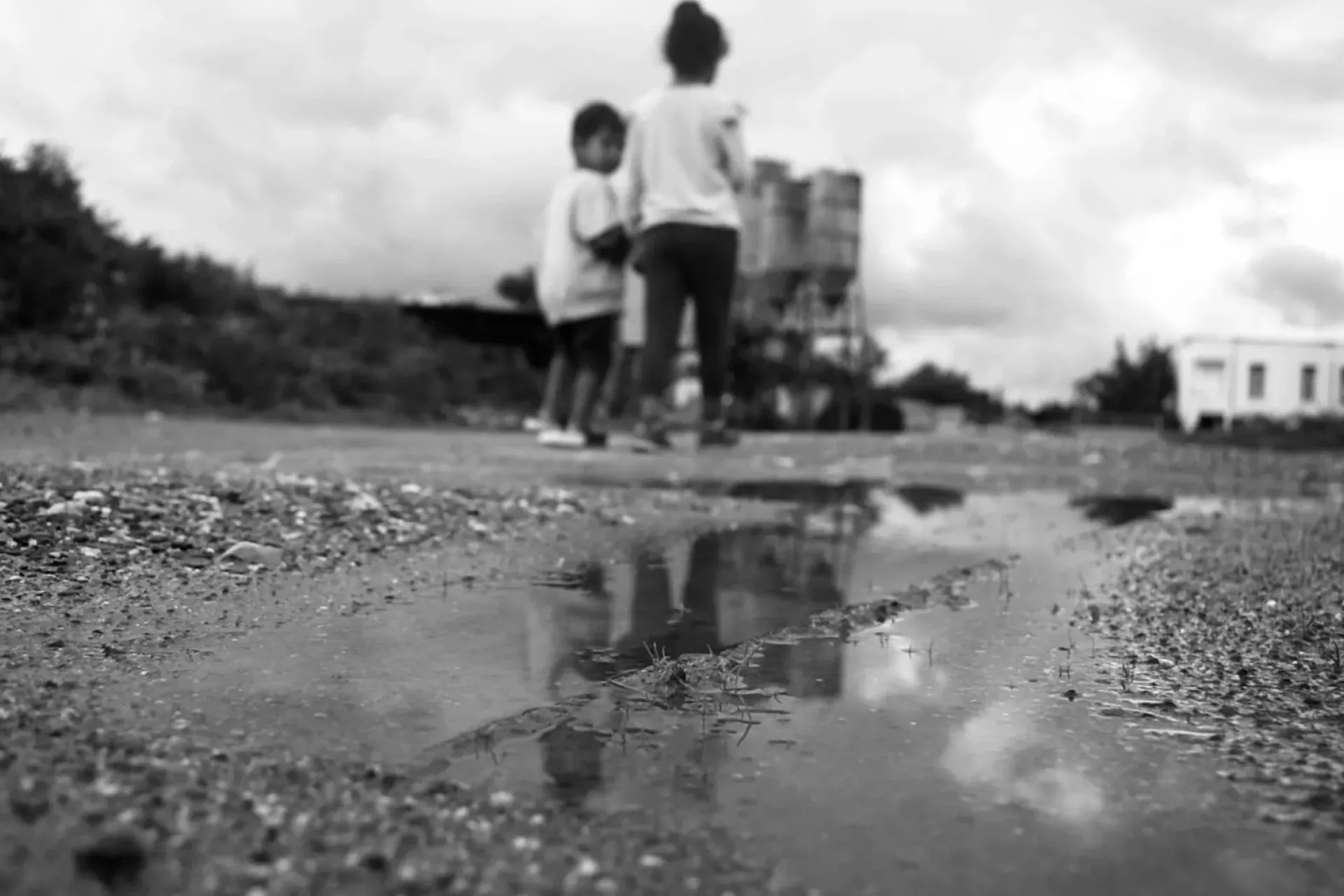 A little boy and girl walking hand by hand