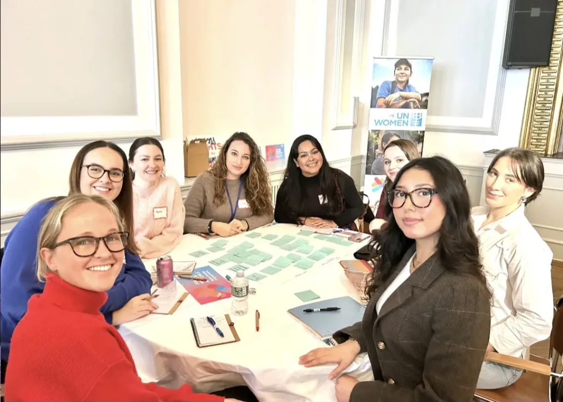 group of women around a round table