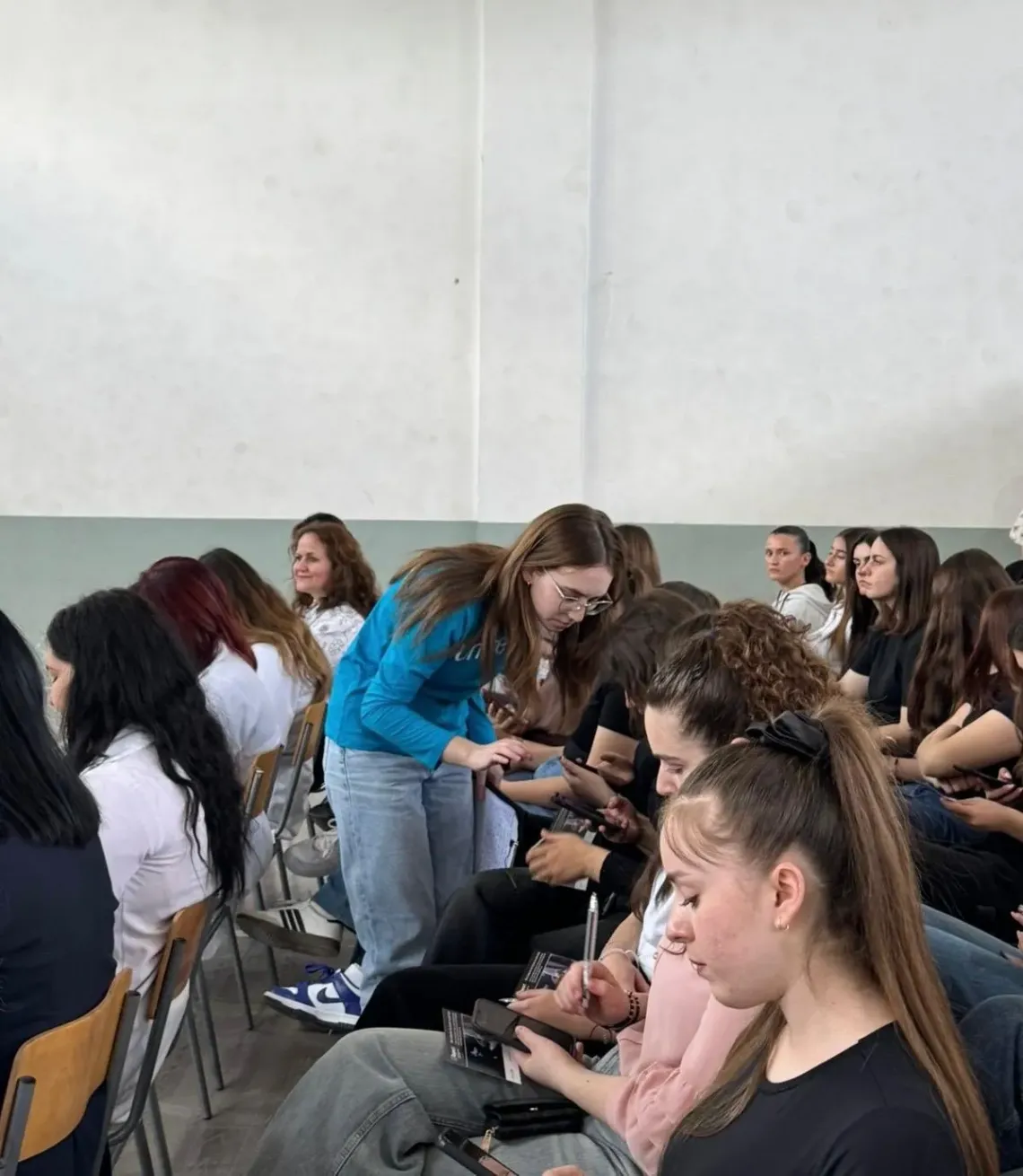 A group of young students in classroom
