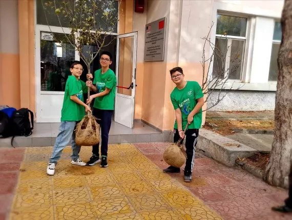 Green Schools team planting trees in their school