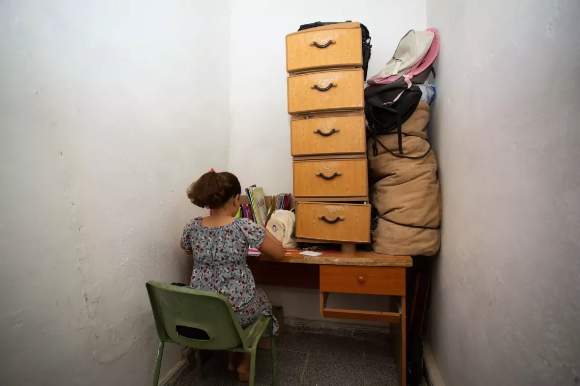 A schoolgirl doing her home work
