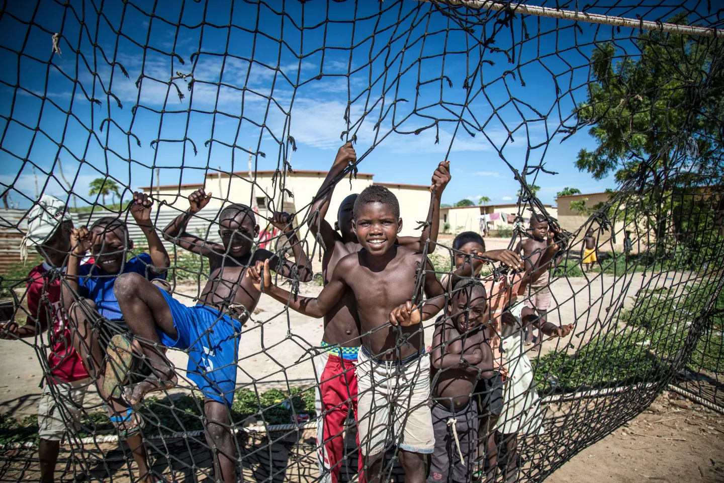 Boys play soccer in Angola