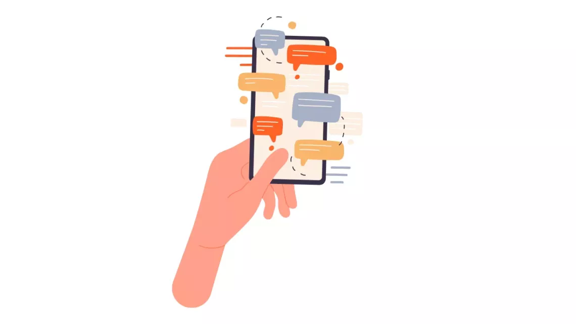 Una mano sostiene un celular
