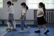 Arpi and her classmates are doing a physical exercises in the school.