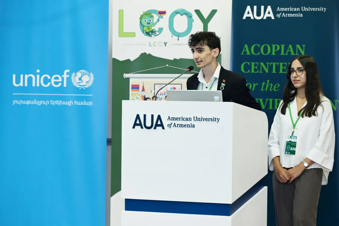 Narek (left) and Ani (right) at the opening session of LCOY 2025 at the American University of Armenia