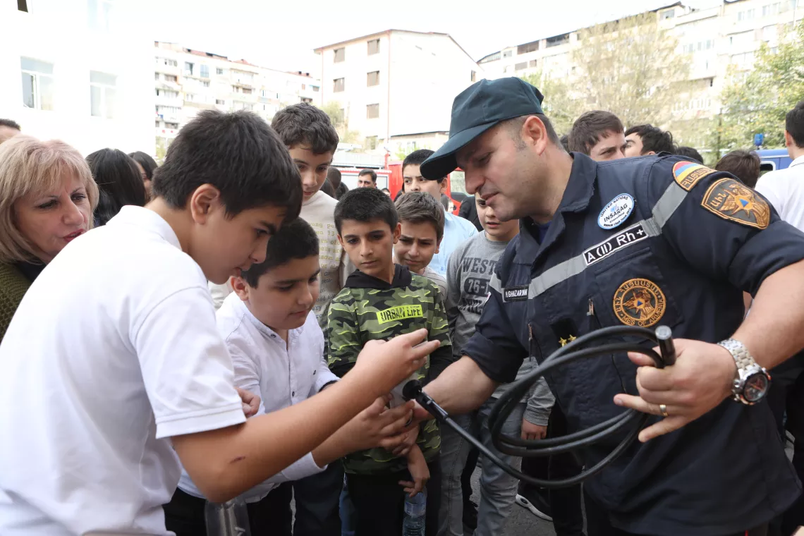 Children and adolescents in Yerevan schools mark the International Disaster Risk Reduction Day with an all-school preparedness drill.
