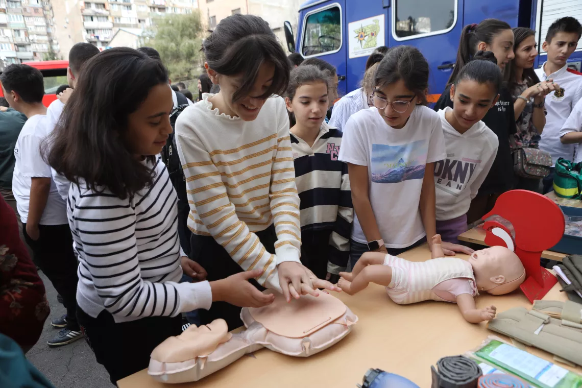 Children and adolescents in Yerevan schools mark the International Disaster Risk Reduction Day with an all-school preparedness drill.
