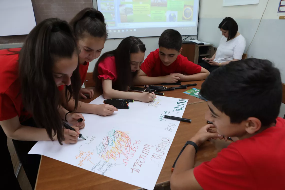 Students and teachers from Yeghegnadzor unveil their project to combat climate change