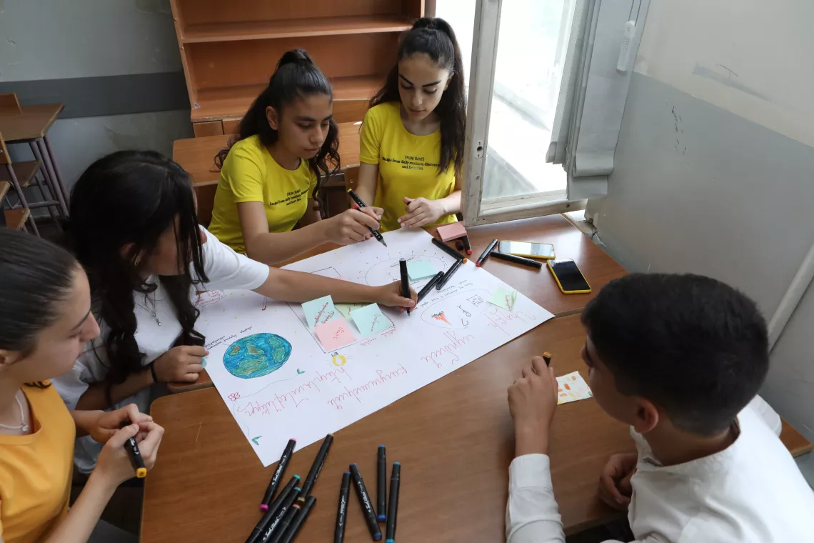Students and teachers from Yeghegnadzor unveil their project to combat climate change