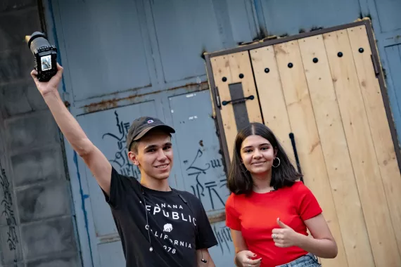Davit and Daniela are filming their short videos on waste sorting 