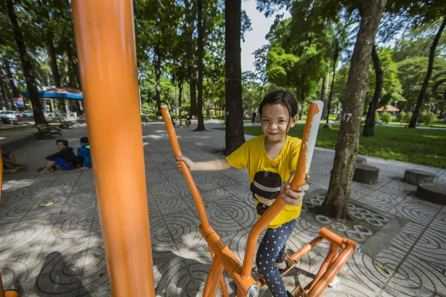 A girl exercises in a park