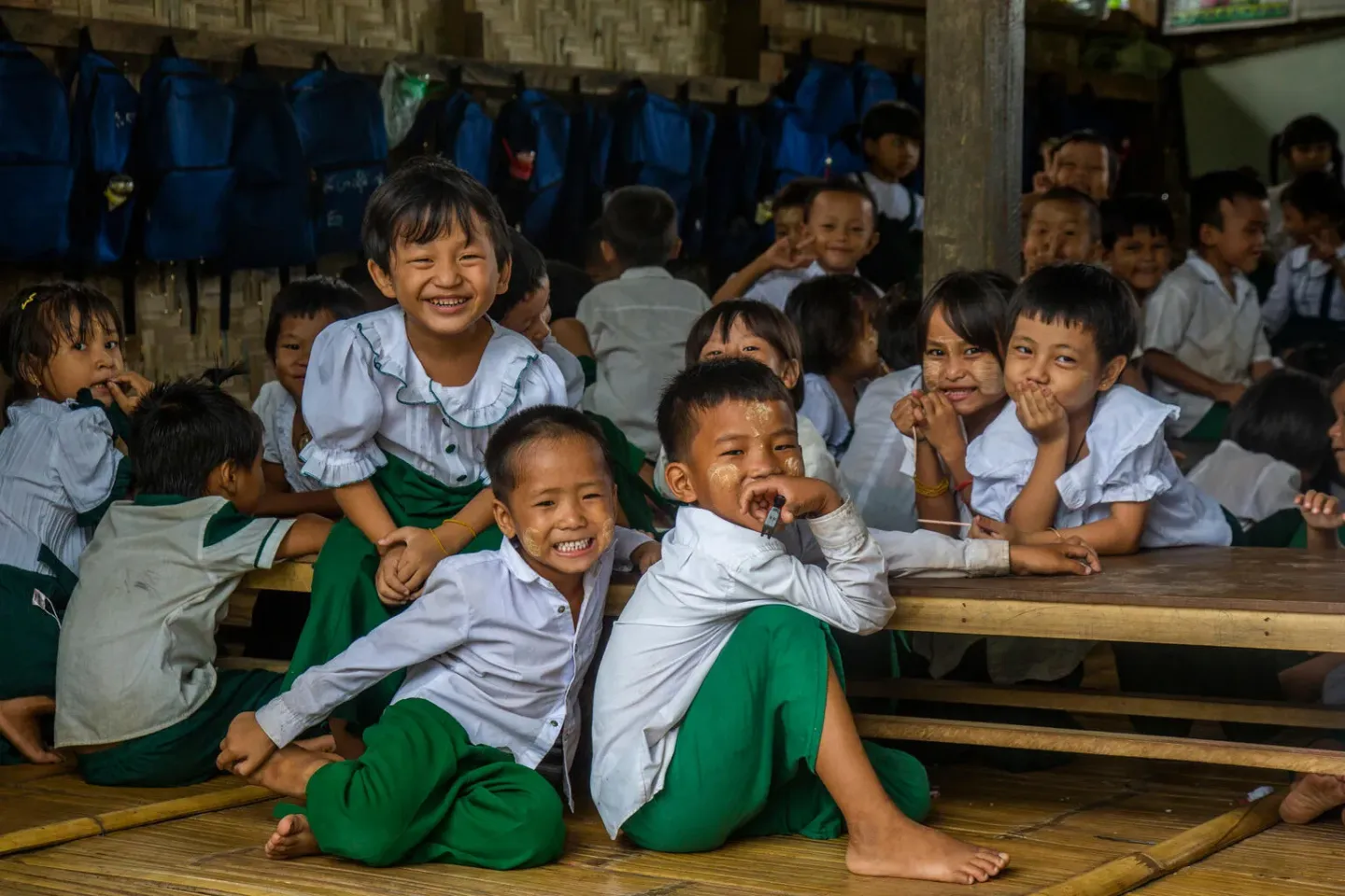 Students are sitting in the canteen school
