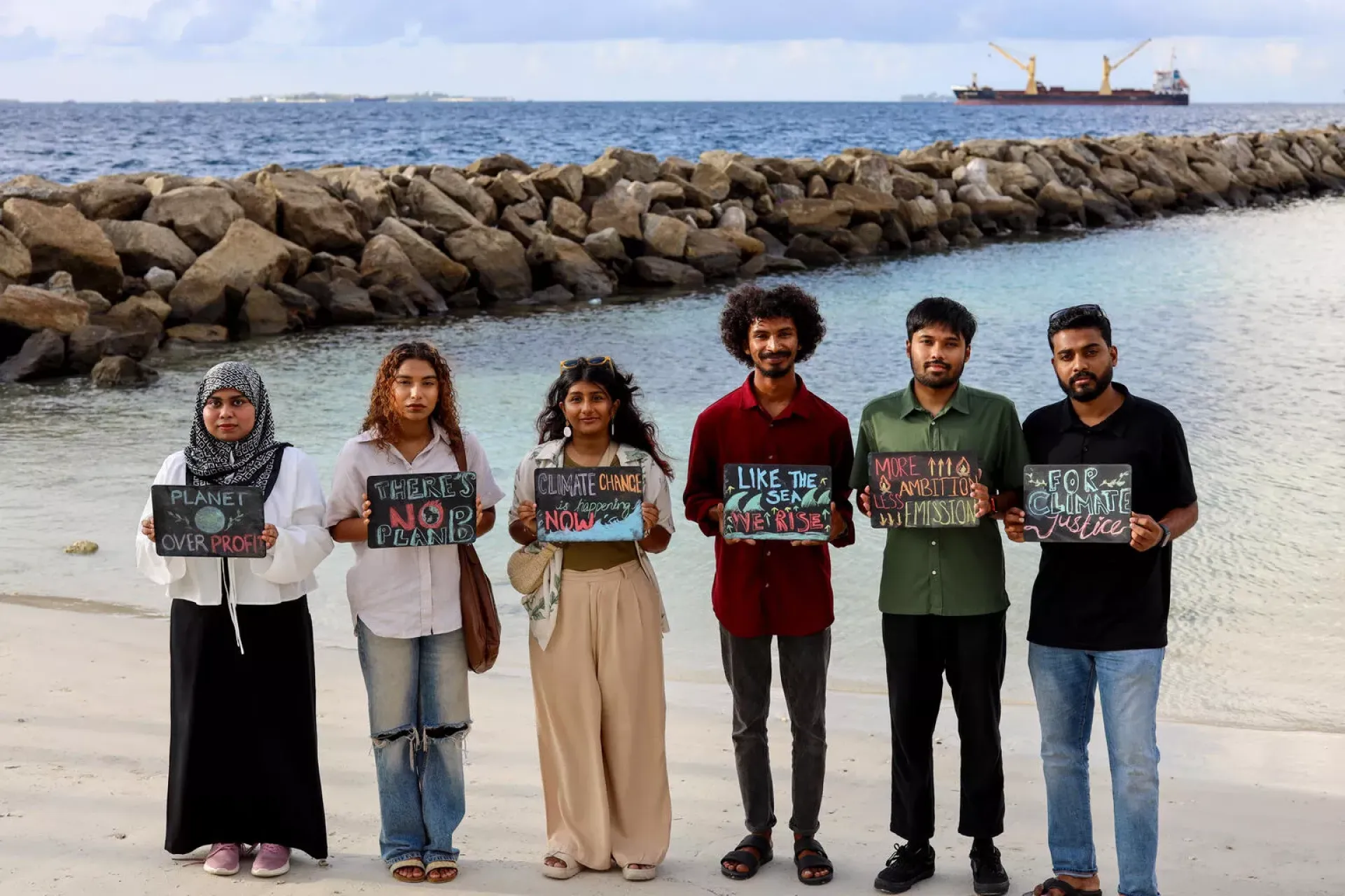 Young people standing united, sending powerful messages on the urgent need for climate action.