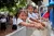 Kim Sovantei (left), 6, and Tin Chantha, 6, wash their hands with other students at the newly installed Water, Sanitation and Hygiene (WASH) station at Sre Chhouk Primary School in Sre Chhouk Village, Rolous Meanchey Commune, Sambo District, Kratie Province, Cambodia. 