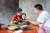  Kaikai's father feeds his two-year-old son, Kaikai, lunch. Kaikai and his parents benefit from the early childhood development (ECD) programme, supported by UNICEF, China