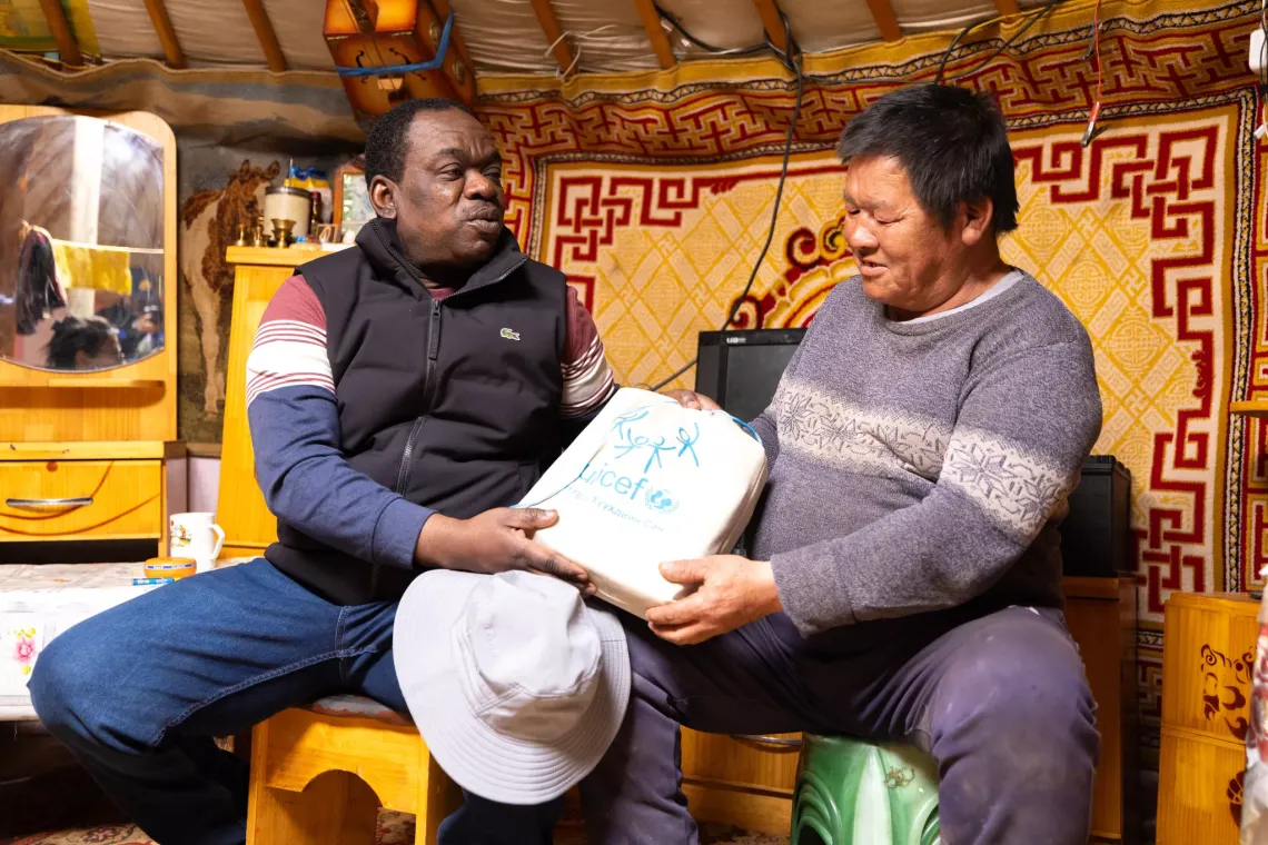 UNICEF Representative Evariste Kouassi-Komlan visited families coping with the aftermath of dzud and delivered essential items to herder families.