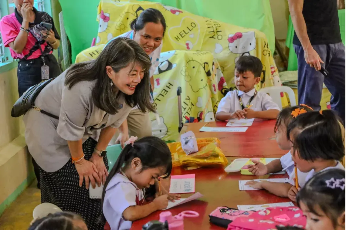 June meets and interacts with schoolchildren in the Philippines