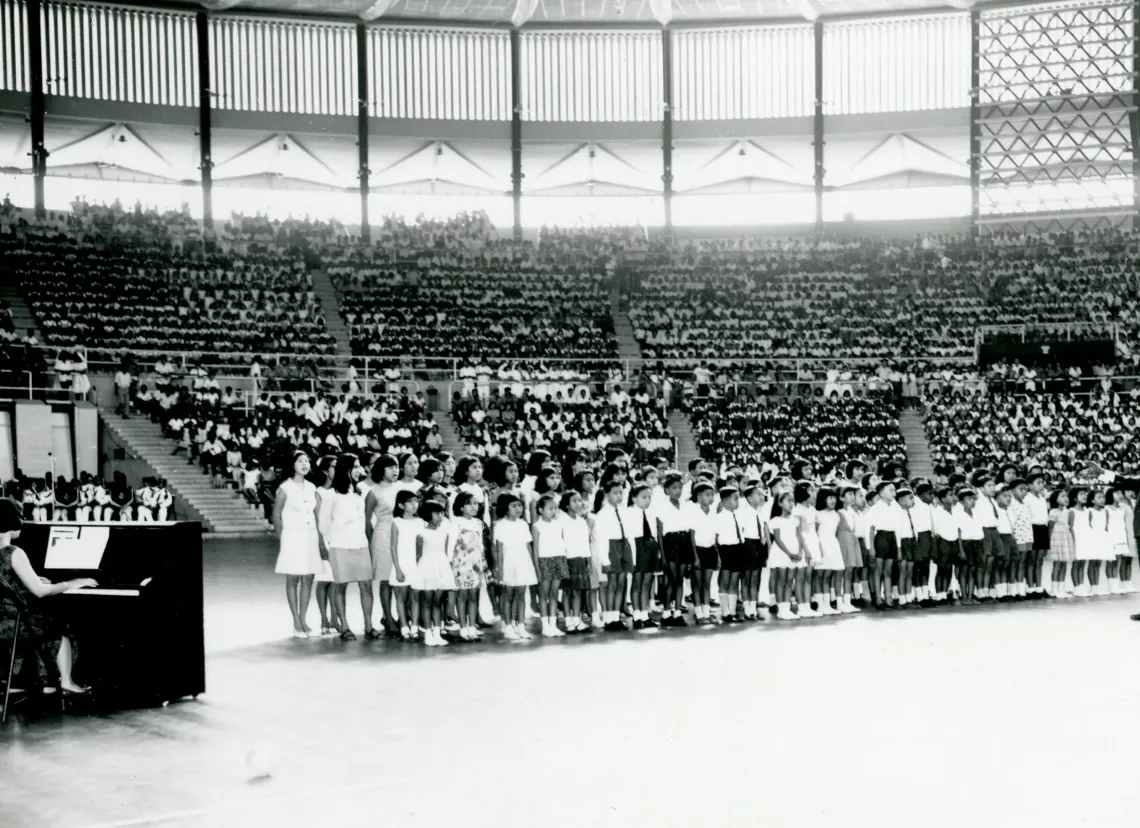 People and children are in the hall