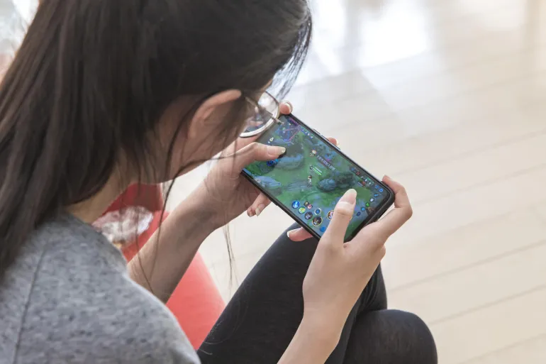 A girl playing her favorite online game