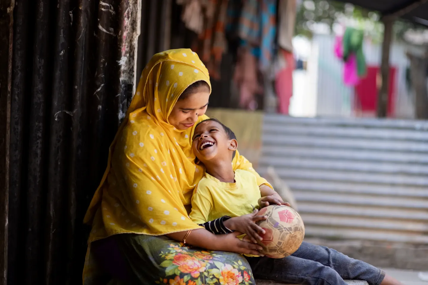 Pinky Akhter embraced her son five-year-old son Muhammad