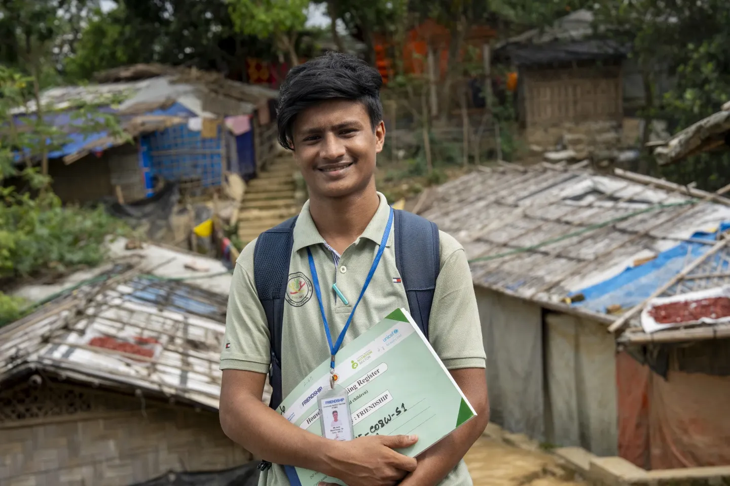 Mohammad Amin (22), stands outside the Integrated Nutrition Facility in the Rohingya refugee camp 