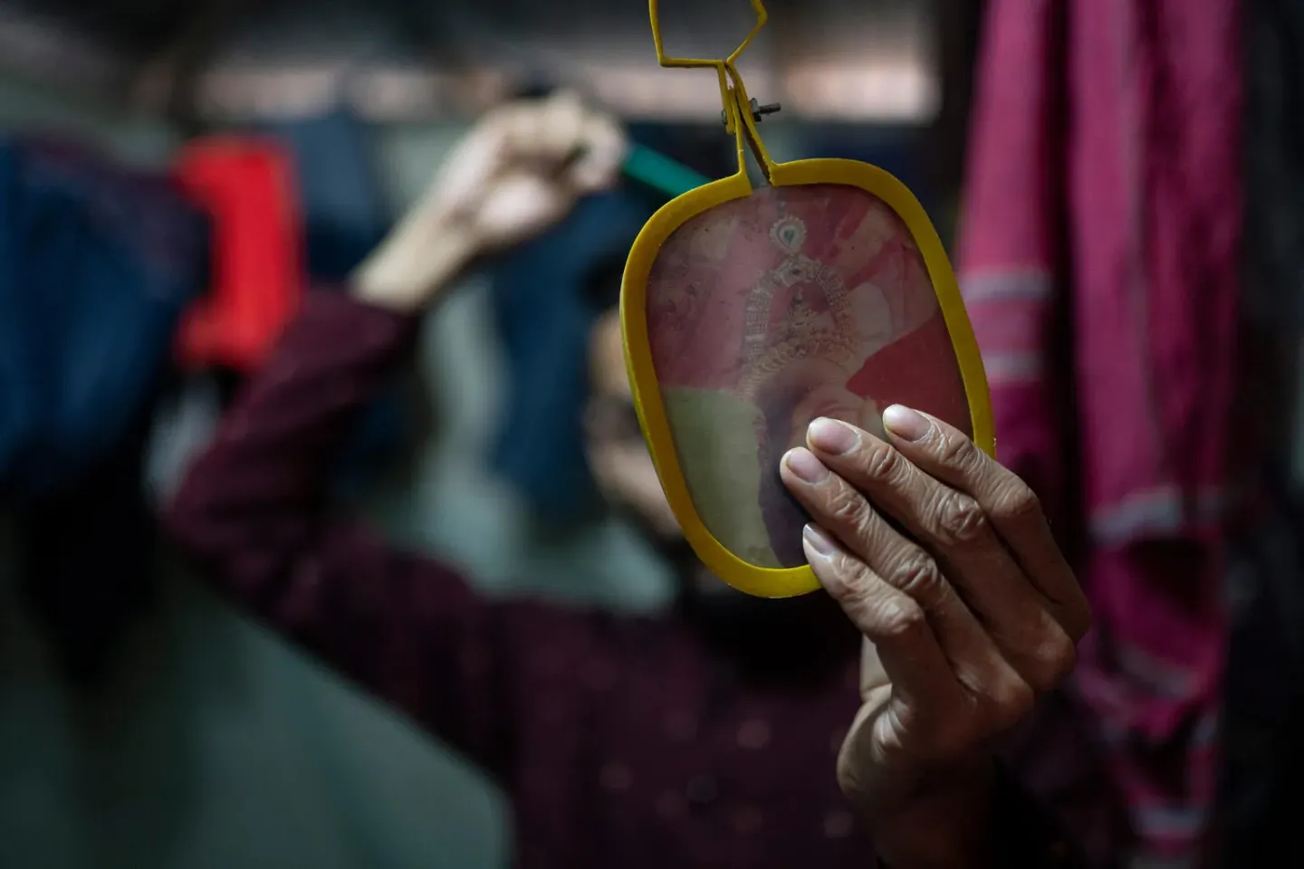 Ahan gets ready for work. It has been two months since he arrived in Dhaka.