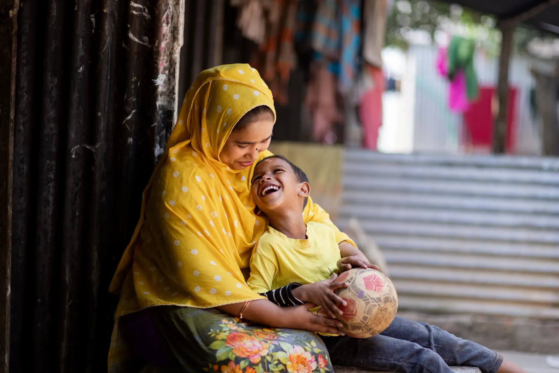 Pinky Akhter embraced her son five-year-old son Muhammad
