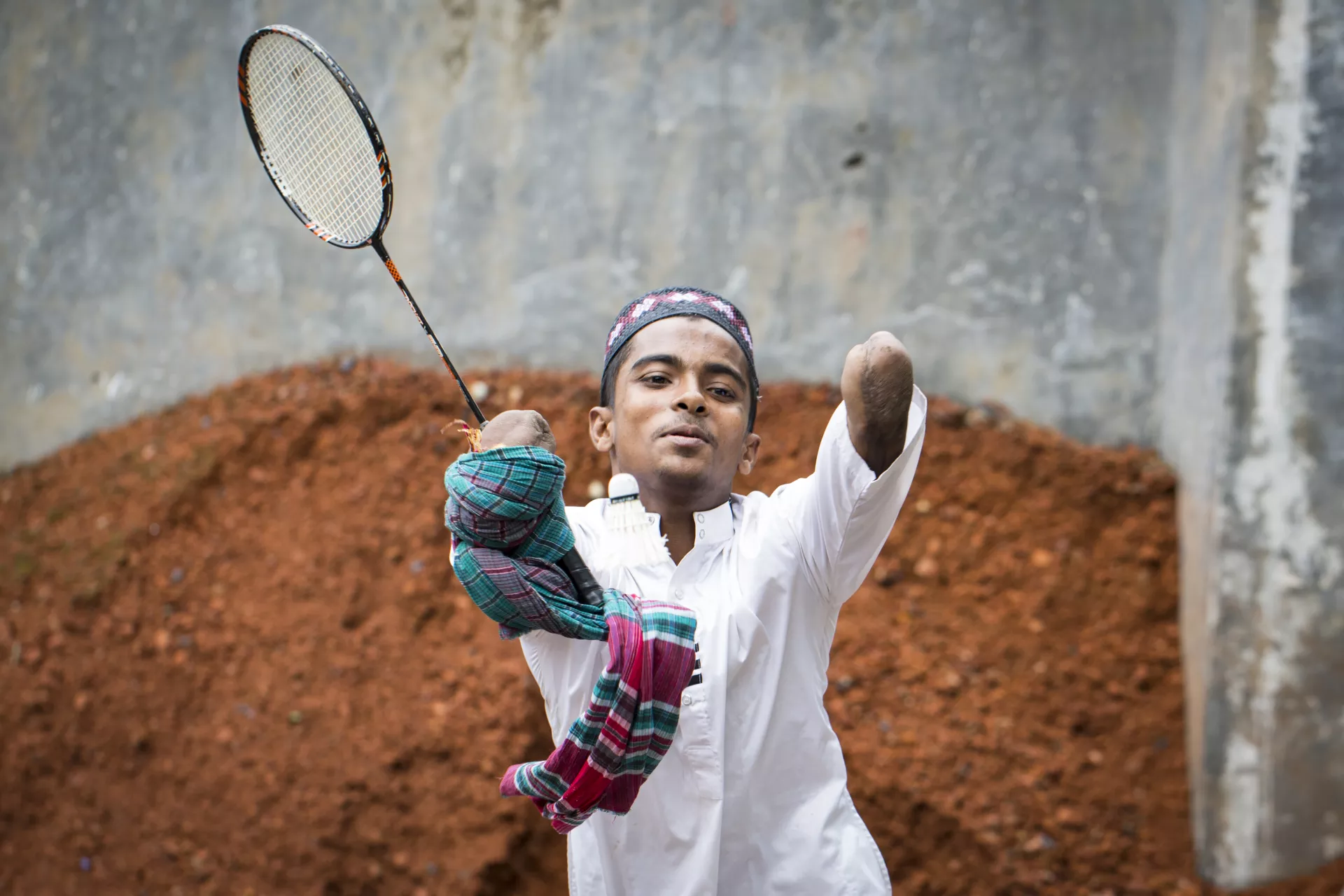 A disable boy playing badminton 