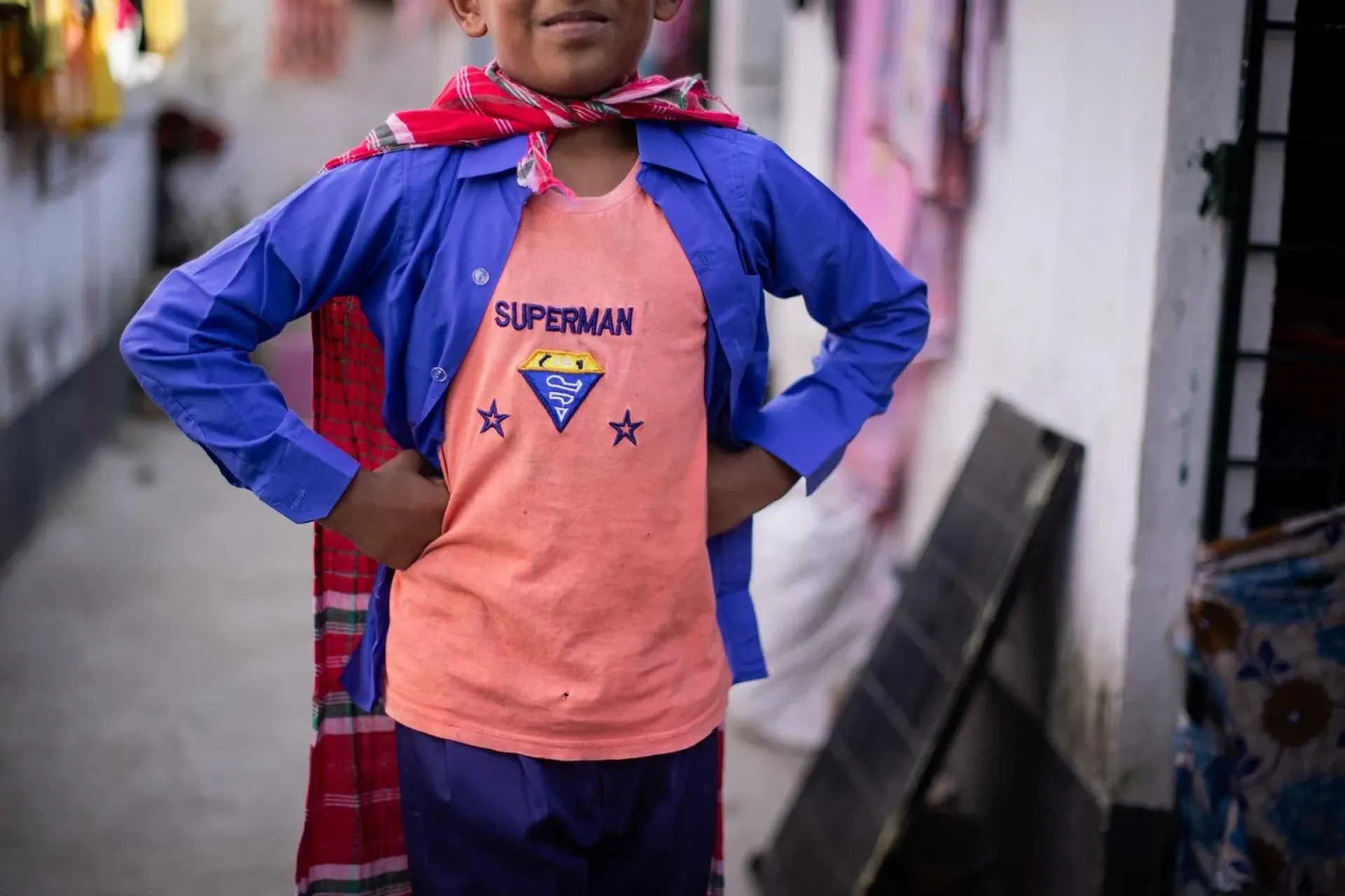 12-year-old Abrar strikes the Superman pose. 