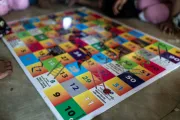 Members of the Child Leaders Group play the hygiene dice game in the Rohingya refugee camps.