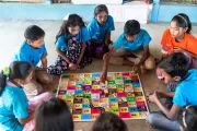 Members of the Child Leaders Group play the hygiene dice game in the Rohingya refugee camps.