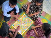 The WASH-themed Ludo board, captured from above, turns familiar gameplay into a tool for sharing child-friendly hygiene messages.