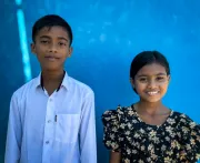 As child leaders, Sirajul Islam and Noor Sadia, both 12, use games and everyday moments to inspire their friends to follow safe hygiene practices.