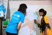 Mim takes her turn to make the hub brighter and welcoming to more children like herself.